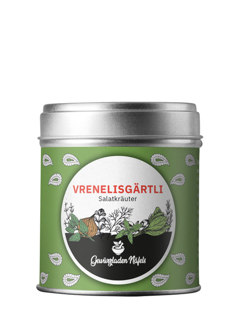 Eine grüne Gewürzdose mit silbernem Deckel, beschriftet mit "Vrenelisgärtli Salzkräuter" und einer Abbildung von Kräutern.