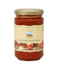 Ein Glas Terra Verde „Bolognese Vegetariana“-Sauce mit einem cremefarbenen Etikett, das Illustrationen von Tomaten, Zwiebeln und Bohnen zeigt.