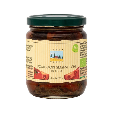 Ein Glas Terra Verde Bio halbgetrocknete Tomaten in Öl.
