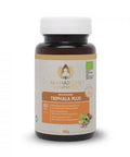 Eine dunkelbraune Flasche Maharishi Ayurveda „Triphala Plus“ Bio-Nahrungsergänzungsmittel mit einem weiß-orangen Etikett, dem EU-Bio-Siegel und einem Inhalt von 60 Tabletten.