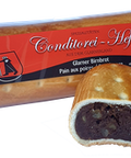 Ein Conditorei Hefti „Glarner Birnbrot“ Produkt, das einen ganzen in Plastik verpackten Laib mit rotem Etikett und eine abgeschnittene Scheibe zeigt, die die dichte, dunkle Frucht- und Nussfüllung freilegt.