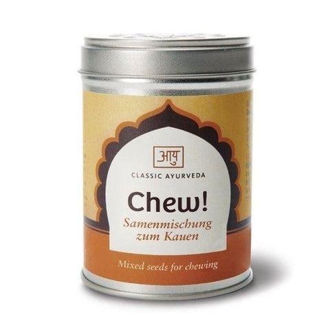 Eine silberne Metalldose „Chew! Samenmischung zum Kauen“ von Classic Ayurveda mit einem gelb-orangefarbenen Etikett und einem bogenförmigen Design.