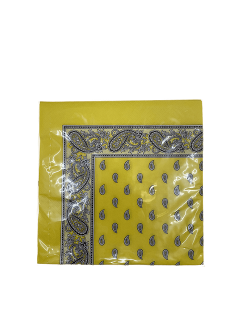 Eine eingeschweißte Packung leuchtend gelber Papierservietten mit einer schwarz-weißen Paisley-Bordüre und einem passenden Tropfenmuster in der Mitte.