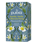 Pukka Teepackung, blau, mit Kamille, Vanille und Manuka-Honig, verziert mit Blüten und Bienen.