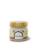 Ein kleines Glas „Kokosfett“ (Coconut Butter) von Classic Ayurveda mit goldfarbenem Deckel und einem Etikett, das Palmenmotive sowie ein grünes Bio-Siegel zeigt.