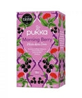 Eine Schachtel Pukka Bio Morning Berry Kräutertee mit lila und rosa Verpackung.