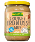 Glas "Rapunzel Crunchy Erdnuss Mus" (Bio Erdnussmus mit Salz & Erdnussstückchen) mit gelbem Deckel und beigem Etikett, auf dem Erdnüsse und ein grünes Bio-Siegel abgebildet sind.