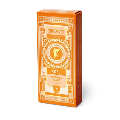 Eine orangefarbene Packung Sirocco „Colombia Nariño“ Kaffeekapseln aus 100% Arabica, verziert mit goldenen Art-déco-Mustern und dem Markenlogo.