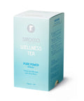 Eine minzgrüne Kartonverpackung für Sirocco „Wellness Tea Pure Power“ mit silberweißer Aufschrift und einer Seitenwand, die eine mehrsprachige Zutatenliste mit grünem Tee, Mate und Zitronengras zeigt.